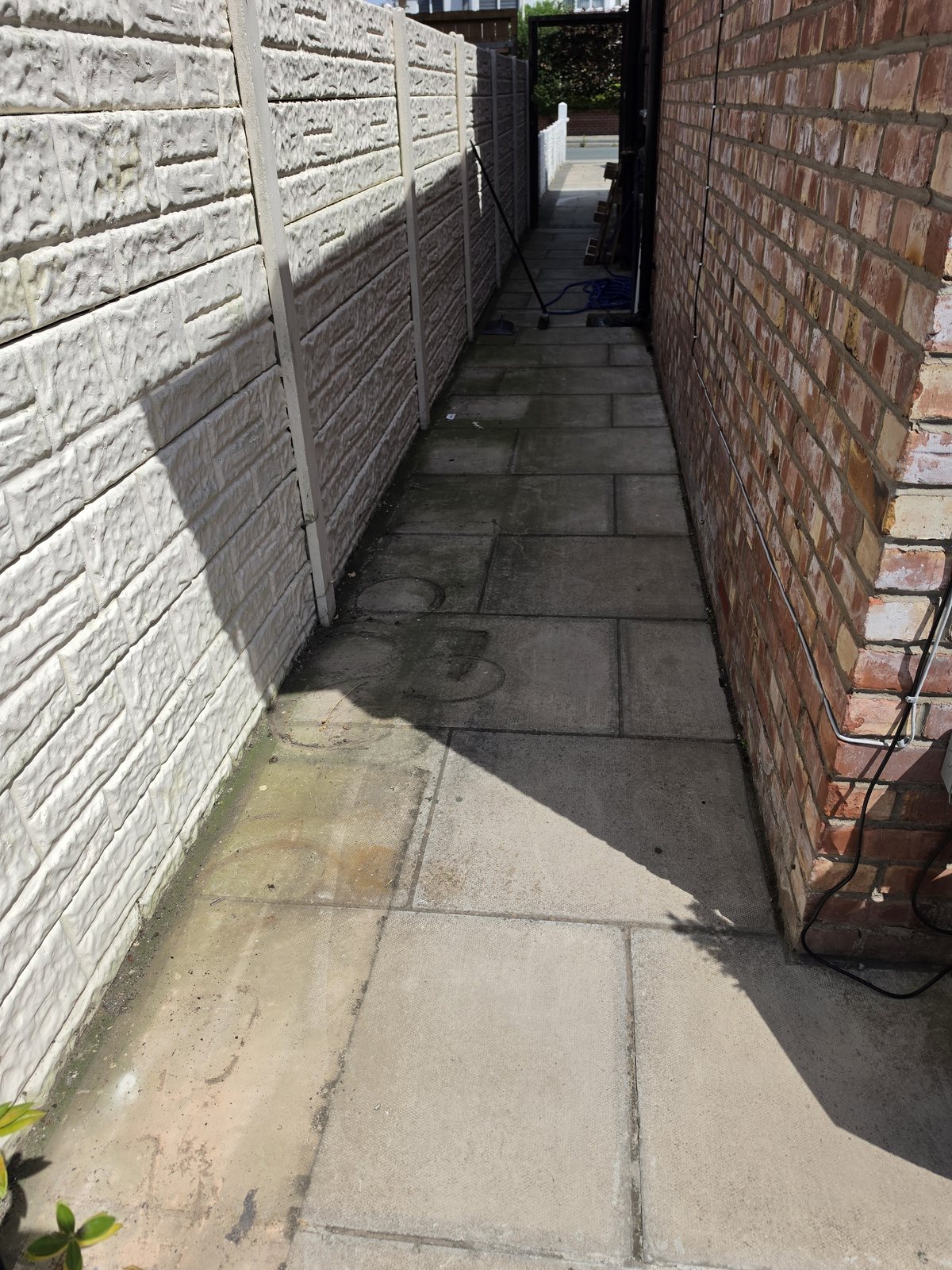 Before alley and path pressure washing in Southport