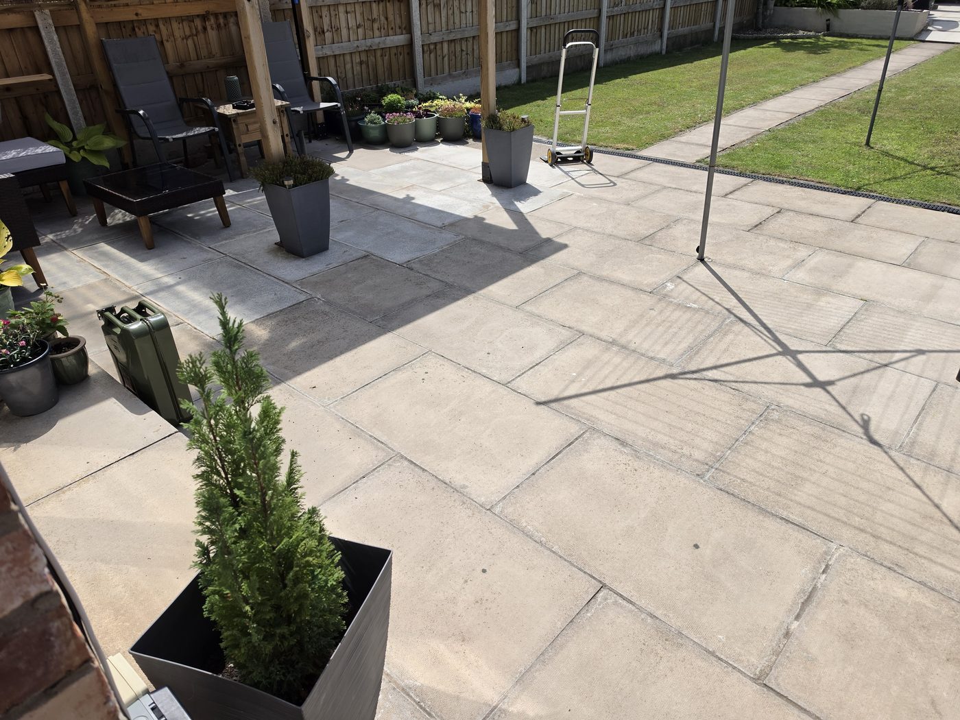 Before driveway and hard surface cleaning photo in Southport by Evans Exterior Services